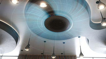 Samsung 360-Grad-Kassette an der Decke mit visualisierter Luftzirkulation in alle Richtungen. Modernes Design mit umliegenden Lampen für gleichmäßige Raumklimaverteilung | © Samsung