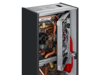 Detailaufnahme der Samsung EHS Hydro-Unit mit geöffnetem Gehäuse, die Rohrleitungen und integrierte Technik wie Magnetfilter, 3-Wege-Ventile und Heizregelung zeigt. | © Samsung